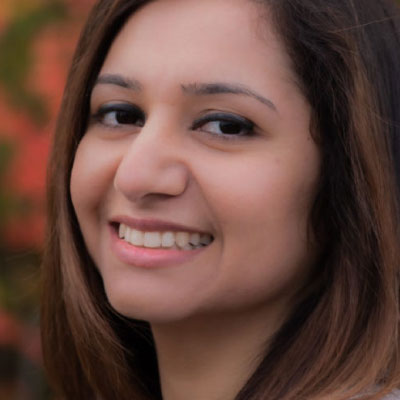 Close-up smiling woman with brown hair